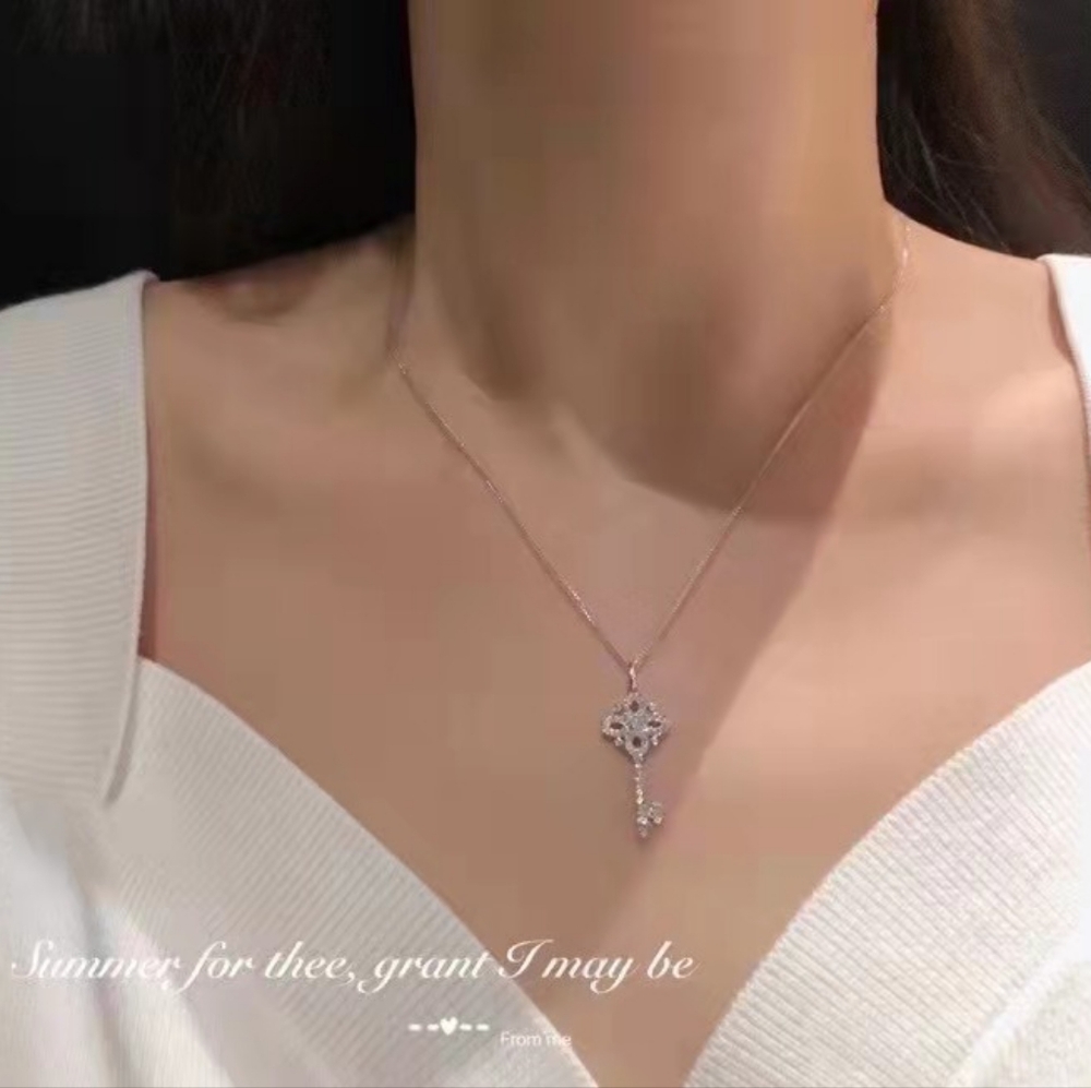 Sterling silver diamond key necklace